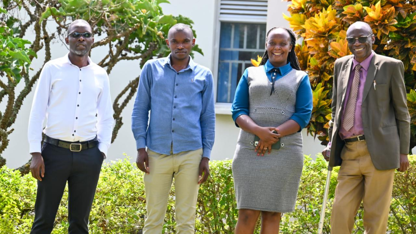 Jean Bosco Mbonyumuvunyi  Second from the Left